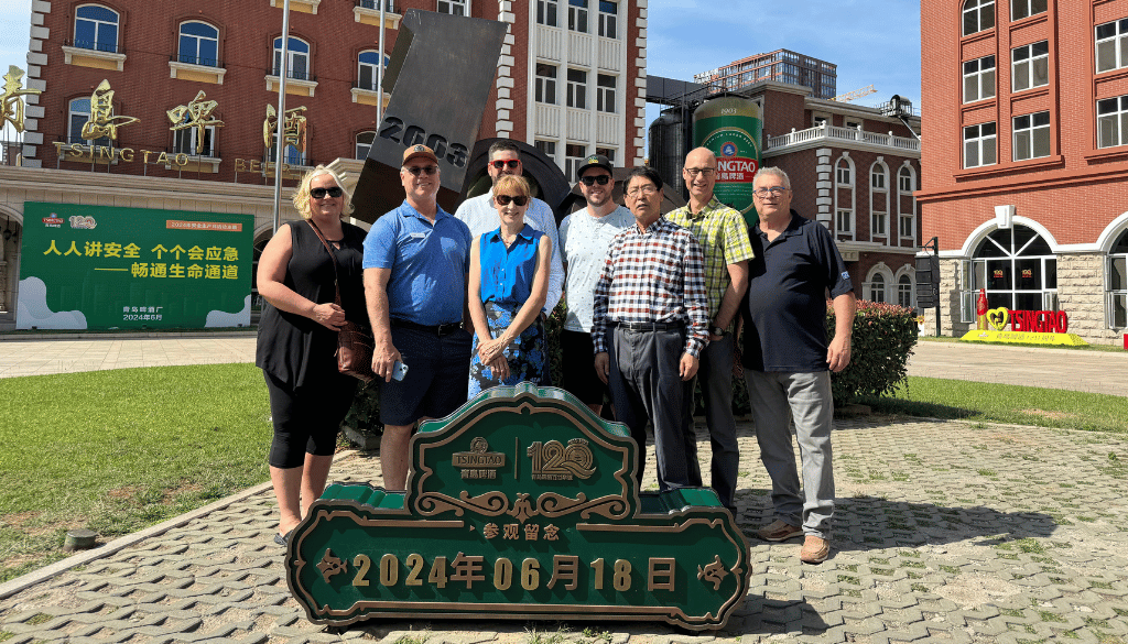 Representatives of the Canadian barley value-chain pose in front of the Tsingtao Brewery during the 2024 Canada-China Barley Seminar in Qingdao, China in June.